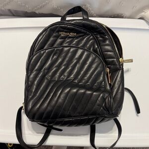 Michael Kors Black Quilted Backpack with Gold Details
